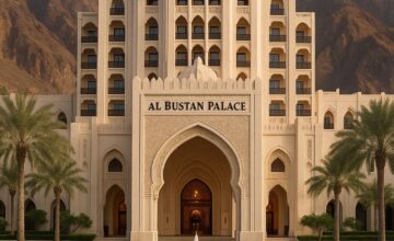 Al Bustan Palace grand entrance with mountains behind
