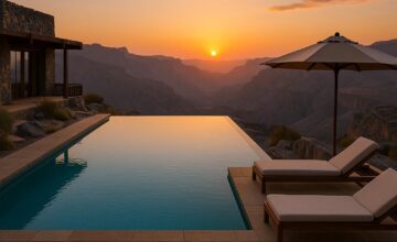 Infinity pool with panoramic mountain canyon views at Alila Jabal Akhdar