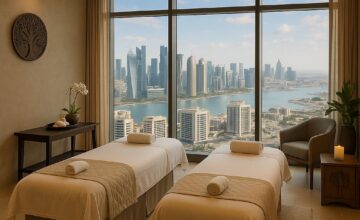 Luxurious spa treatment room with panoramic view of Doha skyline