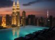 Banyan Tree Kuala Lumpur rooftop infinity pool at night with city lights