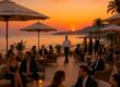 Château Saint-Martin & Spa beachfront lounge with sunset views and vibrant atmosphere