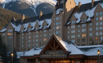 Fairmont Chateau Whistler entrance with snowy mountains