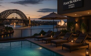 Rooftop pool at Four Seasons Hotel Sydney overlooking Sydney Harbour at sunset