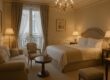 Le Meurice luxury guest room with soft lighting and plush décor