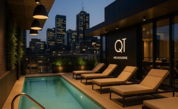 QT Melbourne rooftop pool scene at sunset, stylish loungers and vibrant atmosphere