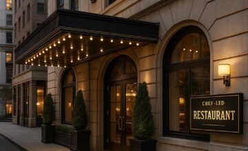 Taj Campton Place entrance with warm lighting and elegant design