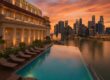 Rooftop infinity pool at The Fullerton Hotel Singapore with sunset view