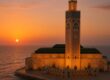 Stunning Hassan II Mosque overlooking the Atlantic Ocean at sunset in Casablanca.