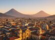 Panoramic view of Quetzaltenango and nearby volcanoes at sunrise