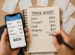 Traveler tracking expenses with app and receipts