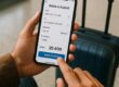 Person using smartphone to book last-minute flight with points