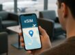 Traveler using smartphone with eSIM during international travel
